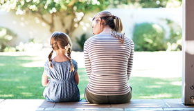 A woman and child sitting
