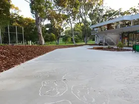 Sandblasted artworks on the path leading to the Driving Range