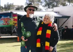 Two Aboriginal people posing for a photo