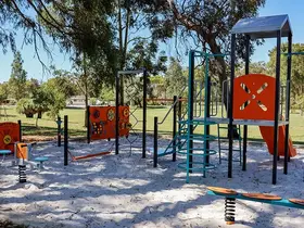 a playground with a playground equipment