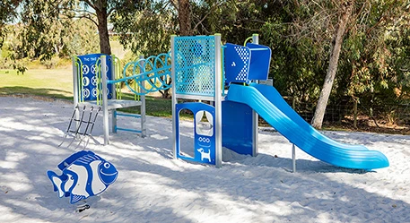 a playground with a slide and a swing