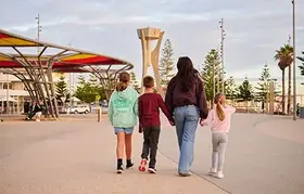 A family walking along the Scarborough Foreshore