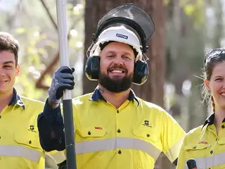 Image of employees outside in natural areas