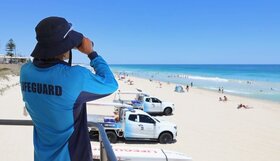 A lifeguard watching the water