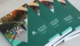 A stack of annual reports