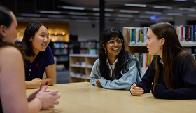 A group of young women chatting