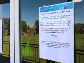 A note pinned to an 'evacuation centre'
