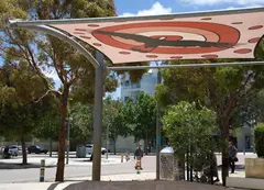 a large banner over a metal structure