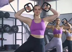 A group of women lifting weights