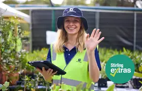 A volunteer at the Free Trees and Plants giveaway