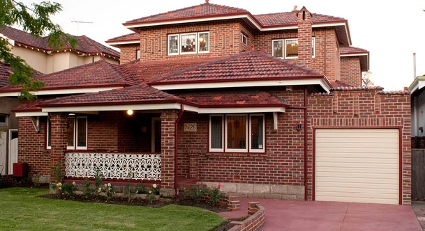 a brick house with a garage