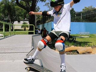A young person skateboarding