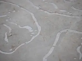 Ground based sandblasted treatment