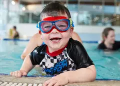 A child swimming in a pool
