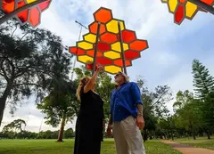 People admiring a public artwork