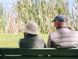 Image of community members watching the model boats at Jackadder Reserve