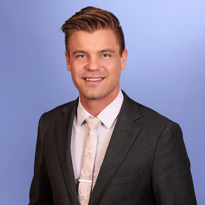 a man in a suit and tie