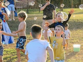 Image of children playing in bubbles at an event in Karrinyup