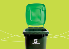 A residential bin with a lime lid