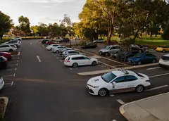 A Security patrol car in a parking lot