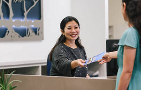 Image of the business concierge assisting a customer
