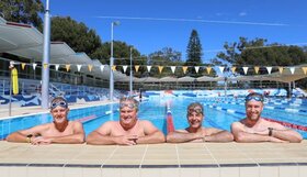 Mayor Mark Irwin and CEO Stevan Rodic with swimmers