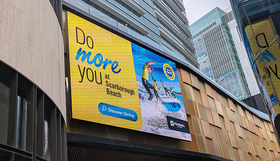 A billboard featuring the Do More You campaign