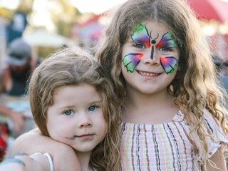 Image of children with face paint on at an event at Rannoch reserve