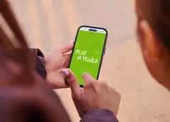 A person opening the Play Trails app