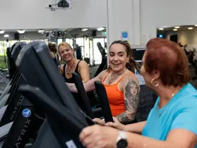 Women on cardio equipment