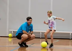A child kicking a ball