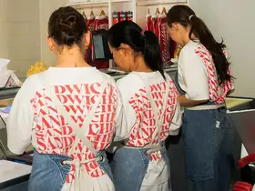 The team at Two Slices making sandwiches