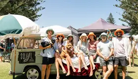a group of people posing for a photo