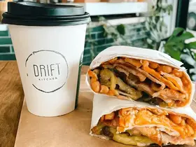 Two wraps and a coffee at Drift Kitchen